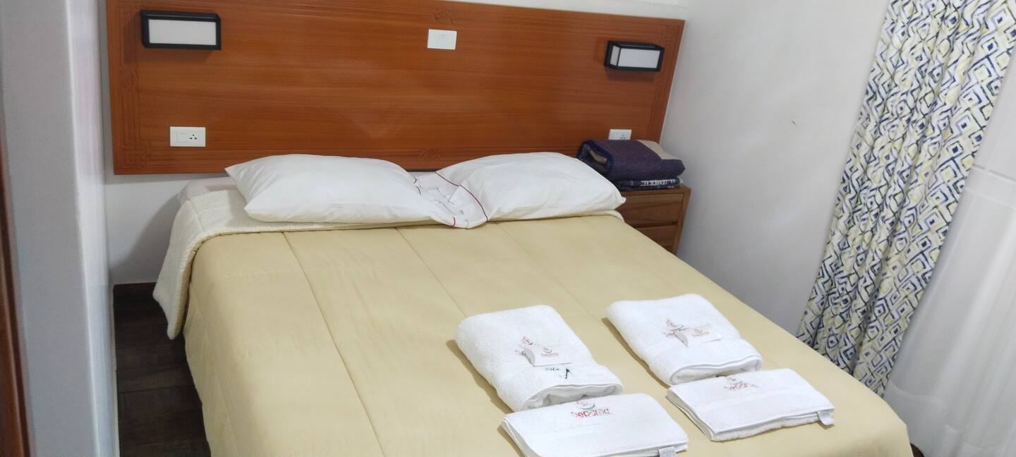 dormitorio cama queen